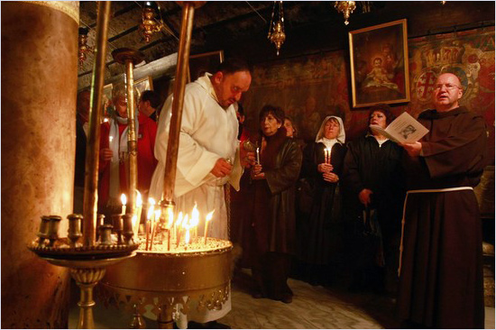 Catholics pray in the Grotto of the Church of the Nativity December 23, 2008 in the biblical town of Bethlehem in the West Bank Catholics_israel.jpg