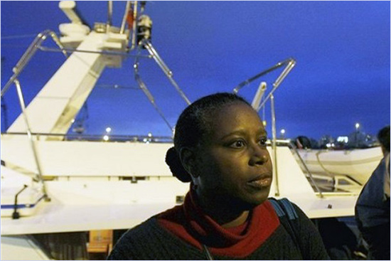 Former U.S. congresswoman Cynthia McKinney is seen in front of boat before setting sail with boxes of medical supplies aboard, for Gaza from the Cypriot port of Larnaca, Cyprus McKinney.jpg