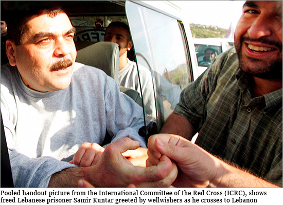 Pooled handout picture from the International Committee of the Red Cross (ICRC), shows freed Lebanese prisoner Samir Kuntar greeted by wellwishers as he crosses to Lebanon Samir-Kuntar_550.jpg