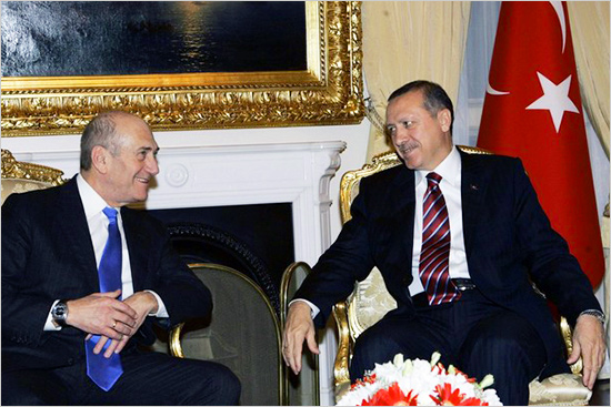 Israeli Prime Minister Ehud Olmert, left, and his Turkish counterpart Tayyip Erdogan chat during a meeting in Ankara, Turkey, Monday, Dec. 22, 2008. erdogan_israel.jpg
