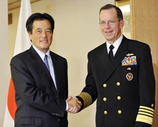 Adm. Michael Mullen, chairman of the U.S. Joint Chiefs of Staff, shakes hands with Japanese Foreign Minister Katsuya Okada prior to talks in Tokyo on October 23. (Yoshikazu Tsuno via AFP) 102309_mullen_okada_315.JPG