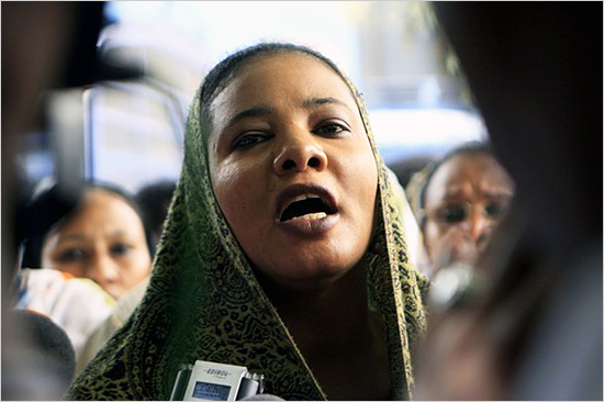 Lubna Hussein, a former journalist and U.N. press officer, talks to the media outside the court after her trial in Sudan's capital Khartoum lubna_hussein.jpg