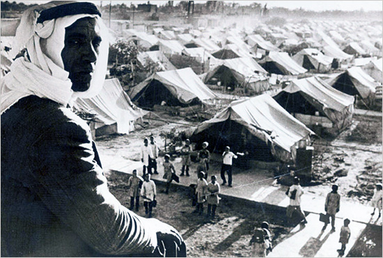 The Palestinian Arabs fleeing their homeland when the armed Anglo-European Ashkenazi Jews arrived in Palestine to slaughter the Palestinian people and to steal their land nakba_550.jpg