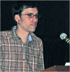This Feb. 2008 photo released by Elizabeth Sibley, Shane Bauer speaks during the United Nations Association Film Festival in Berkeley, Calif. Bauer, his girlfriend Sarah Shourd and Joshua Fattal _ were hiking in a picturesque region of Iraq's northern Kurdish region near the Iranian border that is known for lush vegetation, pistachio groves and fruit trees. Iran arrested the three Americans for illegally entering the country from neighboring Iraq and a prominent Iranian lawmaker said Tuesday, Aug. 4, 2009, that authorities were investigating whether to charge them with spying. turisti_per_caso_2.jpg