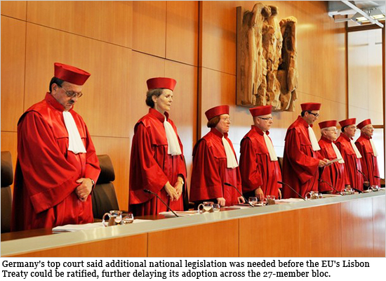 he members of the German Federal Constitutional Court (L-R) Herbert Landau, Gertrude Luebbe-Wolff, Lerke Osterloh, Udo Di Fabio, Andreas Vosskuhle, Siegfried Bross, Rudolf Mellinghoff and Michael Gerhardt announce on June 30, 2009 in Karlsruhe their verdict whether the European Union's Lisbon Treaty is in breach of the country's constitution. germany_UE.jpg