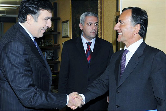 Italy's Foreign Minister Franco Frattini (R) shakes hands with Georgia's President Mikheil Saakashvili in Tbilisi September 4, 2008. gerogia_israel.jpg
