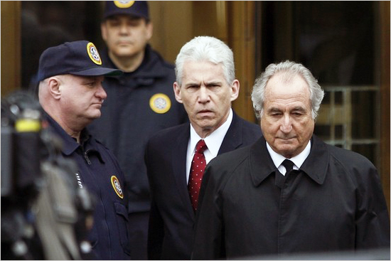 Convicted swindler Bernard Madoff (C) enters his plea of guilty in Manhattan Federal Court in this courtroom drawing March 12, 2009. madoff_mossad_550.jpg