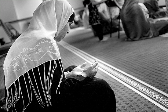 A Muslim woman prays during Friday prayer at a mosque in Cuyahoga Falls muslim_1.jpg