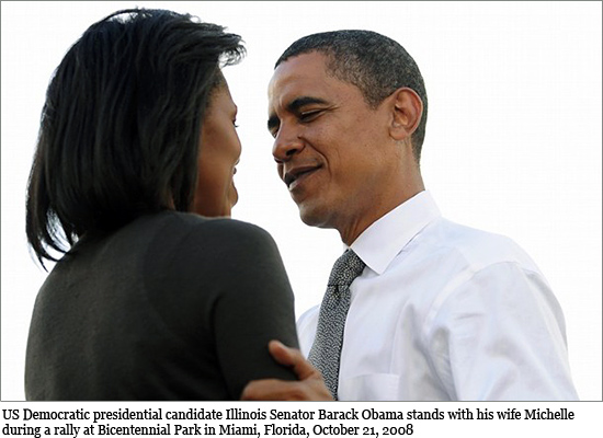 S Democratic presidential candidate Illinois Senator Barack Obama stands with his wife Michelle during a rally at Bicentennial Park in Miami, Florida, October 21, 2008. Obama will leave the White House trail later this week to head to the side of his gravely ill 85-year-old grandmother in Hawaii, just 11 days before the election. obama_kennedy.jpg