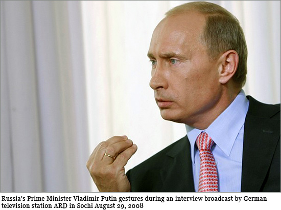 Russia's Prime Minister Vladimir Putin gestures during an interview broadcast by German television station ARD in Sochi August 29, 2008 putin_ard_tv.jpg