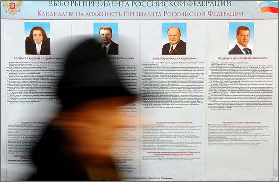 Russian soldiers holding passports lined up for ballot papers at a polling station in Moscow russian_votes.jpg